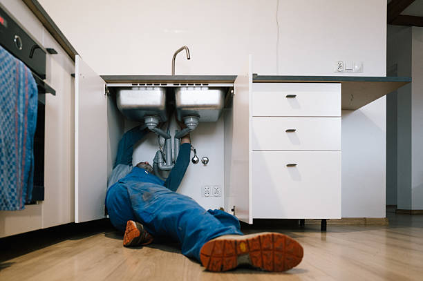 Professional Emergency Plumber technician working in Dixon, IL